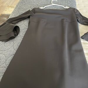 Black cocktail dress with bell sleeves